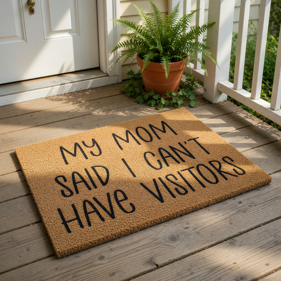 Funny Mom doormat with the text My Mom Said I Can't Have Visitors printed in black on a natural coir fiber welcome mat, perfect for a humorous front porch entrance or a quirky housewarming home decor gift for any mother.