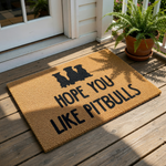 Hope You Like Pitbulls doormat featuring three black dog silhouettes on a natural coir fiber welcome mat, a funny front porch rug for dog lovers that makes a great housewarming gift for any pet owner who loves this specific breed.