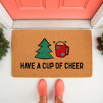 Have a Cup of Cheer Christmas doormat featuring a festive tree and cocoa mug design on a natural coir welcome mat, perfect for holiday porch decor and winter entryway floor mats to greet guests with seasonal cheer at your front