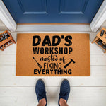 Dad's Workshop doormat featuring a funny fixing everything quote with tool icons, this natural coir welcome mat is a durable outdoor floor rug for a garage or home entrance, perfect for a handyman father who loves DIY home