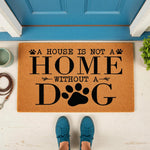 Dog lover welcome doormat featuring the phrase A House Is Not A Home Without A Dog with paw print accents, this natural coir fiber outdoor floor mat is a cute pet owner home decor piece for your front porch entrance or entryway.
