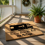 Personalized camper doormat featuring a black motorhome silhouette and the text This is How We Roll, perfect as a custom outdoor welcome mat for camping enthusiasts, RV owners, and family home entryways with a durable natural