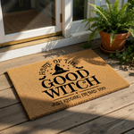 Funny Halloween doormat featuring a witch hat graphic and text reading Home of the Good Witch Just Kidding Im Bad Too, this natural coir fiber welcome mat is a perfect spooky front porch decor piece for your home entry or