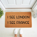 Funny I See London I See France doormat made of natural coir fiber, featuring bold black text on a rustic brown welcome mat for your front porch, entryway, or home decor, perfect for a humorous housewarming gift or apartment