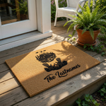 Personalized family name doormat featuring a mountain lake scene with Adirondack chairs and a campfire, this custom coir welcome mat is a durable outdoor floor rug for your front porch entry, home decor, or housewarming entrance.