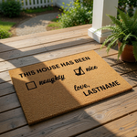 Personalized Christmas doormat featuring a naughty or nice checklist design on natural coir fiber, perfect for a festive holiday welcome mat or front porch decor that displays your family name for a custom seasonal home entrance.