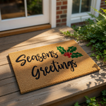Seasons Greetings holiday doormat featuring festive holly and berry graphics on a natural coir fiber welcome mat, perfect for winter porch decor and outdoor entrance floor mats during the Christmas season for a festive home