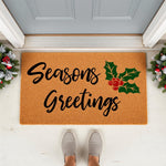 Seasons Greetings Christmas doormat featuring festive holly and berry design on natural coir fiber, this holiday welcome mat adds seasonal decor to your front porch entryway for a cozy winter home entrance and festive floor mat