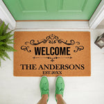 Personalized family name welcome doormat featuring a decorative scroll design and established year, this natural coir fiber entry rug is a custom housewarming gift for a front porch or entryway floor decor in a modern home