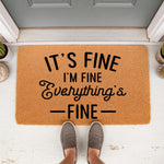 Funny It's Fine I'm Fine Everything's Fine doormat featuring bold black text on a natural coir fiber welcome mat, perfect for a humorous front porch entryway decor piece that adds personality to your home entrance and doorstep.