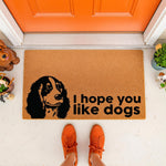 Cocker Spaniel dog doormat with I hope you like dogs text, a natural fiber coir welcome mat for front porch decor, featuring a black dog silhouette design on a durable brown rug for pet lovers and home entryway floor mat styling.