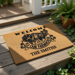 Farmhouse welcome doormat with cow design, featuring a natural coir fiber texture and black printed text that says Welcome To Our Farmhouse, making a personalized outdoor entry rug for a rustic home or country porch decor style.