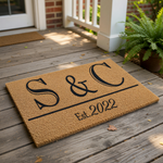 Personalized coir doormat featuring custom initials and established year, this durable outdoor welcome mat is a stylish housewarming decor piece for your front porch, entryway, or home entrance with a classic monogram design.