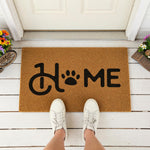 a door mat with the word home written on it