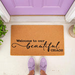 Welcome to our beautiful chaos doormat, a natural coir fiber welcome mat for front porch decor, featuring black script lettering on a durable outdoor rug that adds a fun, funny, and inviting touch to any home entryway or house