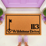 Personalized address doormat with a vintage key design, featuring custom house numbers and street name on a natural coir fiber welcome mat, perfect for a front porch entryway or new home housewarming decor for any front door.