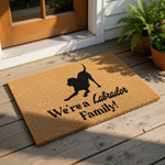 Labrador family doormat featuring a black dog silhouette on natural coir fiber, this durable outdoor welcome mat is a fun home decor piece for dog lovers who want a custom entryway rug for their front porch or house entrance.