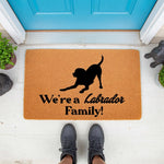 Labrador family doormat featuring a black dog silhouette on a natural coir welcome mat, perfect for dog lovers and pet owners looking for a durable outdoor front porch rug that celebrates their favorite breed in a stylish home