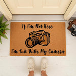 Photographer welcome doormat with a camera illustration and text reading If I'm Not Here I'm Out With My Camera, featuring a natural coir fiber mat design for a front porch entrance that is perfect for photography lovers and