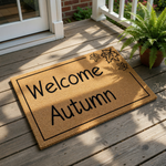 Welcome Autumn coir doormat featuring a natural fiber texture with black text and leaf illustrations, this seasonal fall welcome mat is a durable outdoor rug for your front porch decor during the harvest and autumn holiday season.