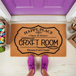 Craft room doormat with Happy Place Open 24 Hours text on natural coir fiber, featuring a fun design for a sewing or hobby space floor mat that makes a stylish entrance rug for any creative home studio or craft room door area.