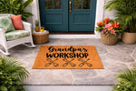 Grandpa's Workshop doormat featuring a durable coir welcome mat design with black text and crossed wrench tools, perfect for a garage, shed, or front porch entrance to celebrate a handy grandfather in his favorite workspace.