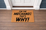 Mechanic doormat with funny quote I'm the mechanic that's why, a natural coir fiber welcome mat for front porch decor, perfect for a garage or home entrance, featuring bold black text on a durable brown outdoor floor mat surface.