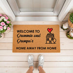 Personalized Grammie and Grampa doormat for a home away from home, featuring a cute house illustration with a red heart on a natural coir welcome mat, perfect for a front porch entrance or a thoughtful housewarming gift for