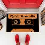 Personalized cassette tape doormat featuring a retro music design on a durable fiber mat, perfect for a front porch entrance.