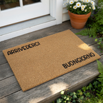 Natural coir doormat with black text reading Buongiorno and Arrivederci, this durable fiber welcome mat is a stylish front porch decor piece for your home entrance, perfect as a functional outdoor floor mat for guests and