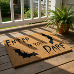 Enter If You Dare Halloween doormat featuring spooky black bat silhouettes on a natural coir fiber welcome mat, perfect for a scary front porch entryway or gothic home decor during the fall season and October holiday festivities.