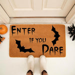 Enter If You Dare Halloween doormat with black bat silhouettes on natural coir fiber, a spooky front porch welcome mat for fall home decor that adds a festive touch to your entryway for the autumn season and holiday party guests.
