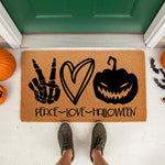Peace Love Halloween doormat featuring a skeleton hand peace sign, a heart, and a spooky jack-o-lantern pumpkin design on natural coir fiber, perfect for a festive fall porch decor welcome mat for the autumn holiday season.