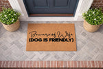 Funny Beware of Wife dog is friendly doormat for front porch entry, featuring bold black text on a natural coir fiber welcome mat, perfect for a humorous home decor entrance or a unique housewarming gift for dog lovers and pet