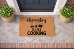 Chemistry is like cooking science doormat featuring laboratory glassware icons on a natural coir welcome mat, perfect for a science teacher or chemist front porch decor with a funny, nerdy, and unique housewarming entrance design.