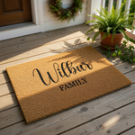 Personalized family name coir doormat featuring a natural fiber texture and elegant black script lettering, making this custom outdoor welcome mat a durable and stylish housewarming entry rug for any front porch or home entrance.