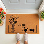 Hello Spring floral doormat featuring a black line art mason jar with flowers on a natural coir welcome mat, perfect for seasonal porch decor and front door entryways to greet guests with a stylish and festive spring home design.