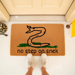 No step on snek doormat featuring a funny snake illustration on natural coir fiber, this humorous welcome mat for front porch entryways adds a playful touch to your home decor with its unique snake design and bold text.