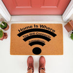 Funny tech doormat with a wifi signal icon and the text Home Is Where The Wifi Connects Automatically, featuring a natural coir fiber texture for a front porch entryway that makes a clever housewarming gift for any tech lover.