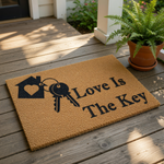 Love Is The Key doormat featuring a house and key graphic on natural coir fiber, this personalized welcome mat makes a charming housewarming entry rug for your front porch or home entryway decor with its durable outdoor design.