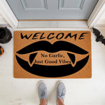 Vampire lips welcome doormat for Halloween porch decor, featuring a natural coir fiber mat with black fangs and text that reads No Garlic, Just Good Vibes, perfect for a spooky entryway or front door entrance during the fall