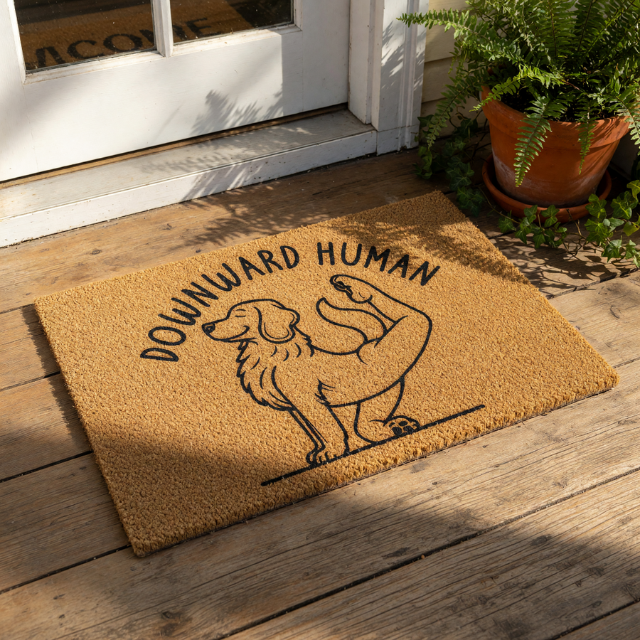Downward Human yoga dog doormat featuring a cute Golden Retriever illustration in a stretching pose on a natural coir welcome mat, perfect for pet lovers and yoga enthusiasts looking for a funny outdoor entrance rug for their