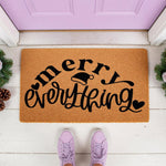 Merry Everything Christmas doormat with a festive Santa hat design on natural coir fiber, perfect for a holiday front porch welcome mat decor.