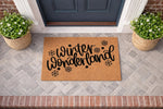 Winter Wonderland coir doormat featuring black script text and snowflake accents, displayed on a gray brick porch as a seasonal holiday welcome mat for front door decor, perfect for festive home entryway and winter porch