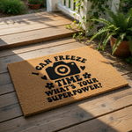 Photographer doormat with I Can Freeze Time What Is Your Superpower text and a camera icon, featuring a natural coir fiber welcome mat design for front porch decor that makes a fun gift for photography lovers and camera