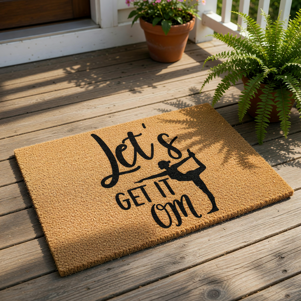 Yoga doormat with Let's Get It Om text and a silhouette of a person in a dancer pose, this natural coir fiber welcome mat is a funny home decor piece for yoga lovers, meditation enthusiasts, and front porch entryway floor mats.