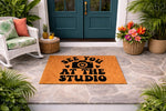 See You At The Studio photography doormat for front porch entry, featuring a camera icon on natural coir fiber.