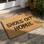 Shoes Off Homie coir doormat with bold black text on a natural fiber rug, this funny front porch welcome mat is a durable outdoor floor mat for your entryway that keeps dirt out of your home with a casual and modern housewarming