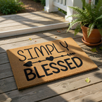 Simply Blessed coir doormat featuring a rustic arrow and heart design, this natural fiber welcome mat is a durable outdoor floor rug for your front porch entry, providing a farmhouse style greeting for guests at your home