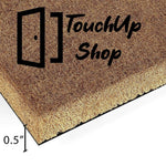 A close-up view of a textured surface, possibly a woven material or a natural plant fiber, with a warm, golden-brown color.